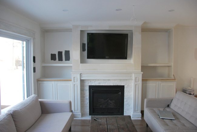 Want to build DIY fireplace built ins? See the play-by-play of how our craftsman style built ins were created using MDF