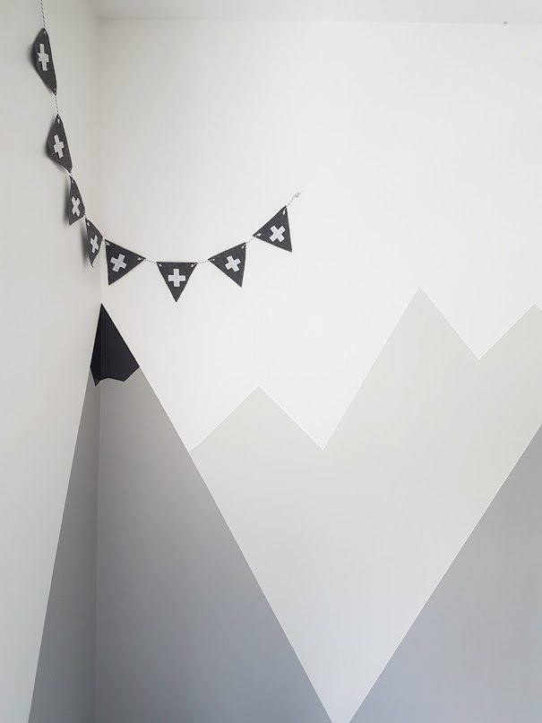 How to paint a #DIY #mountain #mural for a #kids #room or #nursery. Big impact on a budget! Great nursery decorating idea.