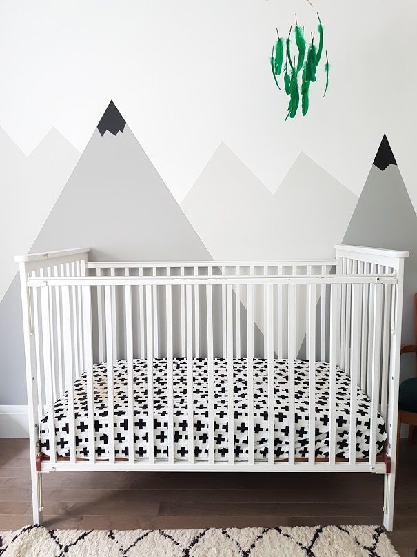How to paint a #DIY #mountain #mural for a #kids #room or #nursery. Big impact on a budget! Great nursery decorating idea.