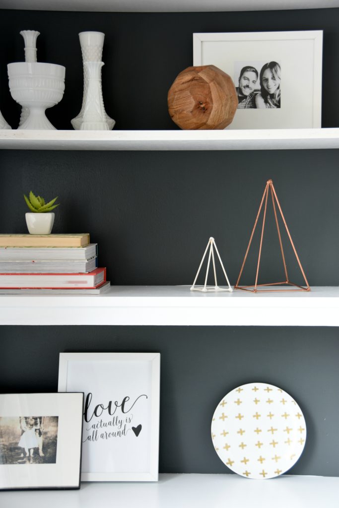 Trying to figure out how to style your shelves? Make these DIY geometric triangle sculptures out of skewers, hot glue, and spray paint. Spray them white, gold, copper, or whatever color suits your decor! An easy project with super high end look. Click through for the full how-to tutorial.