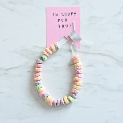 DIY Valentines Candy Necklace | Make this cute kids craft for valentine's day. A fruit loop candy necklace and valentines card - easy and fun! Click through for the full tutorial.