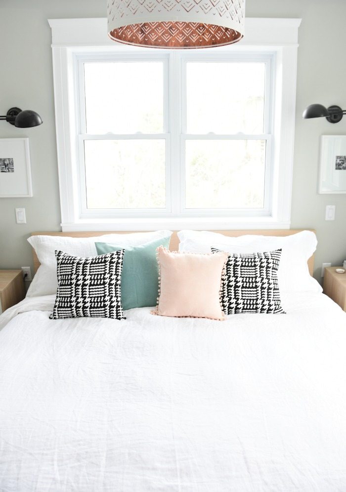 white linen duvet covers - A budget-friendly Master Bedroom Makeover. Get this neutral, eclectic, modern bedroom design with the source list and DIY project ideas in the post. Great bedroom decor ideas and tips!