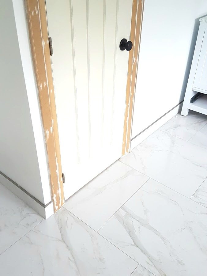 Choosing Faux Carrara Marble Floor Tile For The Bathroom