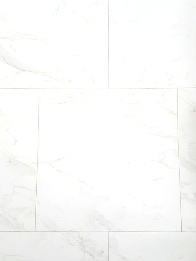 Choosing Faux Carrara Marble Floor Tile For The Bathroom