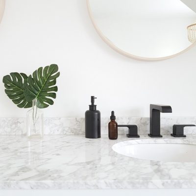 A #Modern #Marble #Bathroom with a #Spa Like Feel. #White with #Black #Faucets - on a budget. Get the look - I'm sharing all the sources in the blog post!