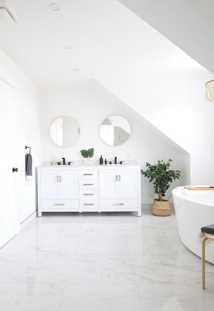 A #Modern #Marble #Bathroom with a #Spa Like Feel. #White with #Black #Faucets - on a budget. Get the look - I'm sharing all the sources in the blog post!