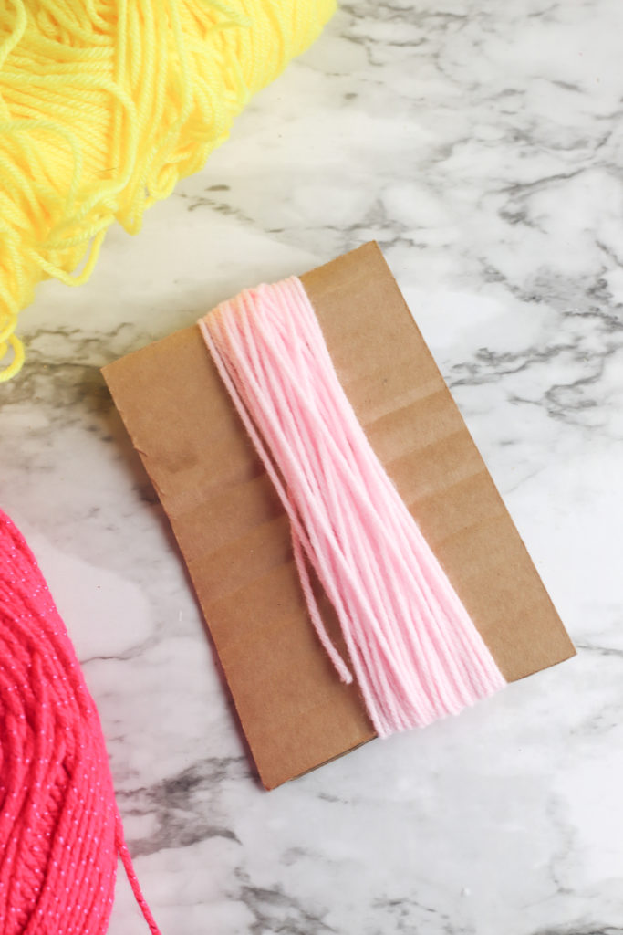Make This Cute Tassel Wall Hanging (with yarn!) - THE SWEETEST DIGS