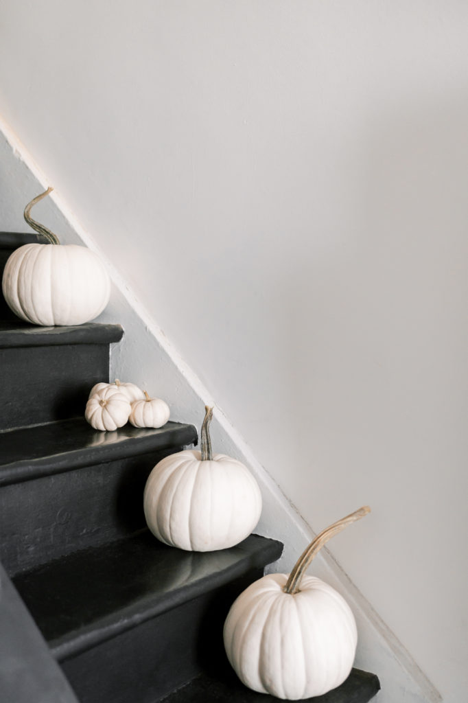 White pumpkins on stairs.